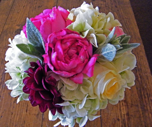 The bridesmaids bouquets were made of white Hydrangea and Roses Pink Peony