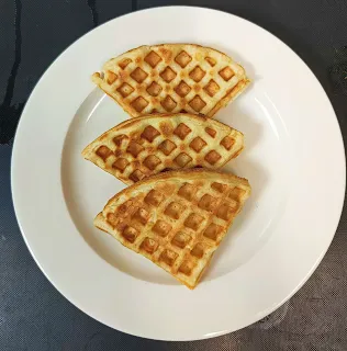 Waffle serving in a plate for Indian breakfast buffet