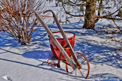 wheel plow in the snow photo by mbgphoto