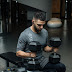 Man sitting on flat bench