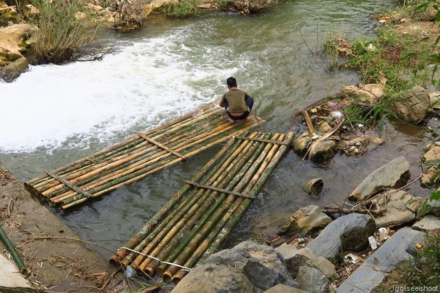 Villagers at Lac village building bamboo rafts