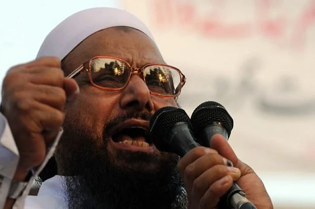 Image Attribute: Hafiz Saeed, co-founder of Lashkar-e-Taiba and the chief or amir of Jama'at-ud-Da'wah, / Source: The UnReal Times