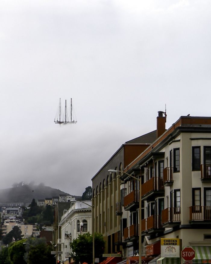 36 Unbelievable Pictures That Are Not Photoshopped - This Picture Of Sutro Tower In San Francisco Makes It Look Like The Top Of The Flying Dutchman's Floating Ship