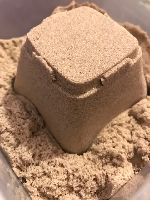 A simple sand castle made with kinetic sand