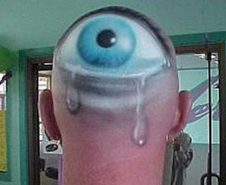 Men with Unique Eyes Tattoo Picture on Head