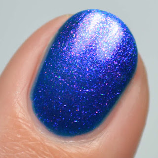 inky blue nail polish with aurora shimmer
