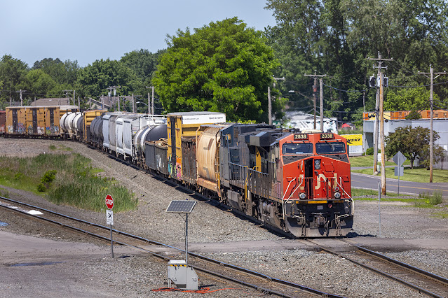 CN 2838 and CSXT 39 are on the head end of a crewless Q560-02 sitting on the North Runner at DeWitt Yard