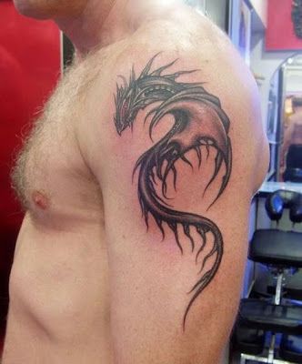 hybrid dragon tattoo design on the arm