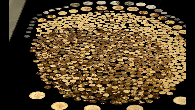 Περίπου το 95% του θησαυρού αποτελείται από χρυσά δολάρια που χρονολογούνται από την εποχή του Αμερικανικού Εμφυλίου Πολέμου. [Credit: Numismatic Guaranty Co.]