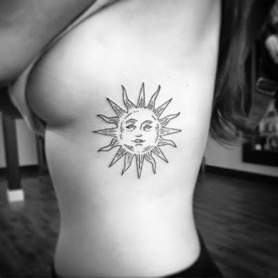 rib tattoos for women