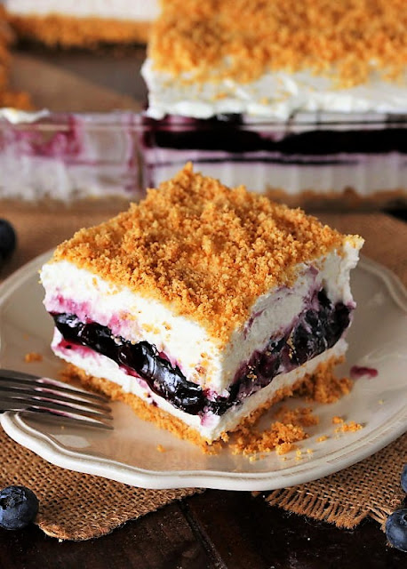  With two fluffy layers sandwiching a layer of blueberry pie filling No-Bake Blueberry Yum Yum