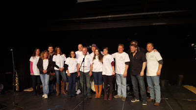 the SAFE Coalition board posed with Mike Zito and The Wheel at the end of the evening