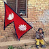 Nepali Boy Baby holding a Nepal National Flag