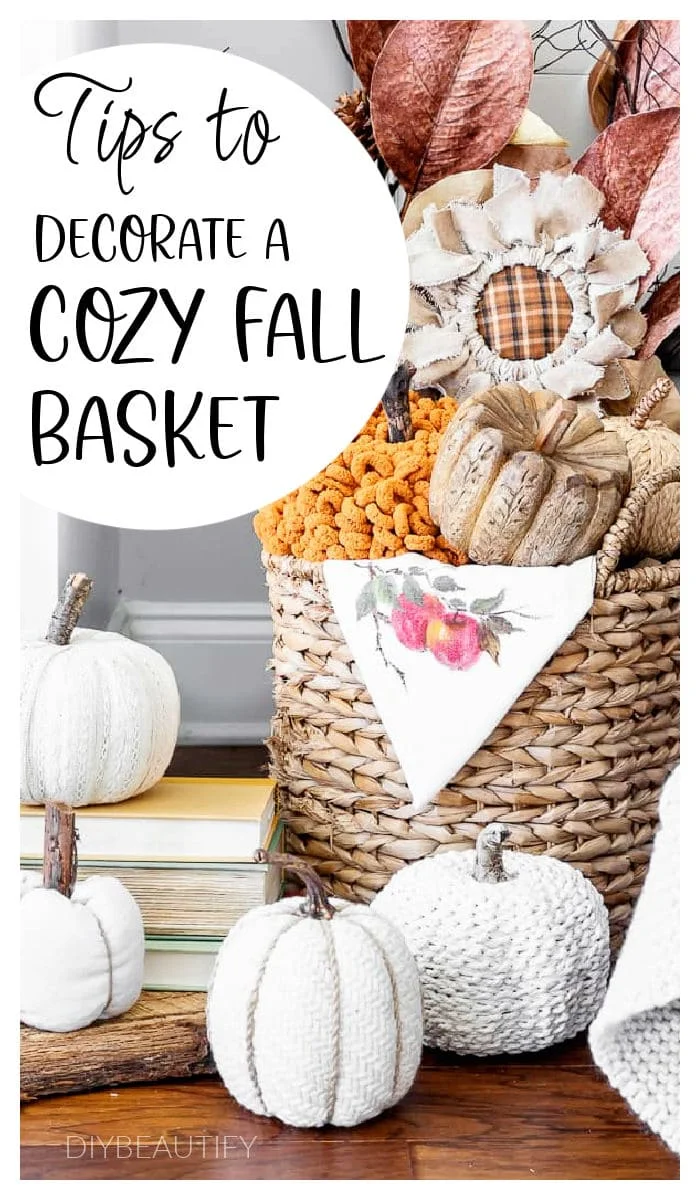 cozy basket filled with pumpkins and fall stems