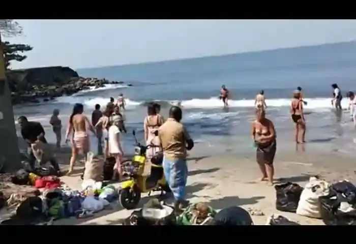 Video of foreign tourists cleaning Kochi beach gone viral