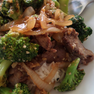 Beef and Broccoli Stir Fry:  Savory beef and crisp broccoli served over rice.