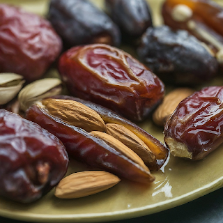 A bowl of fresh Medjool dates, perfect for breaking the Ramadan fast.