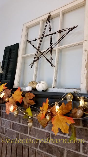 Fall Mantel with Glass Acorns. Share NOW. #falldecor #fall #decoratedmantels #eclecticredbarn