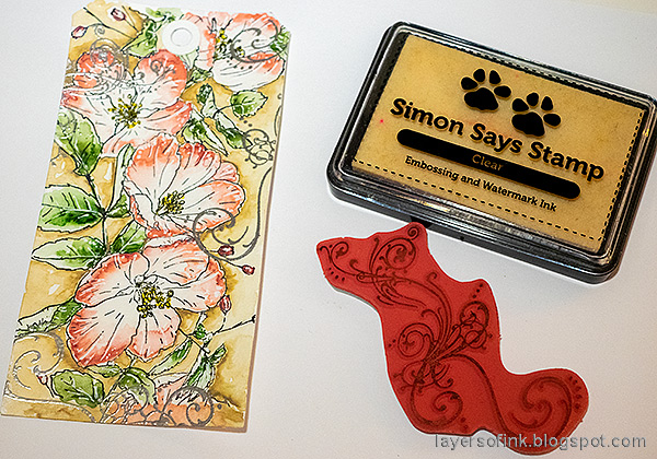 Layers of ink - Wild Rose Watercolor Tag Tutorial by Anna-Karin Evaldsson. Silver emboss swirls.