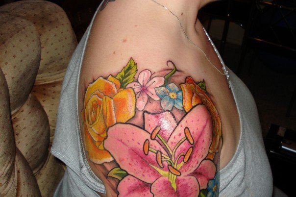 In fact flower will be best idea to get on front of my shoulder Tattoo