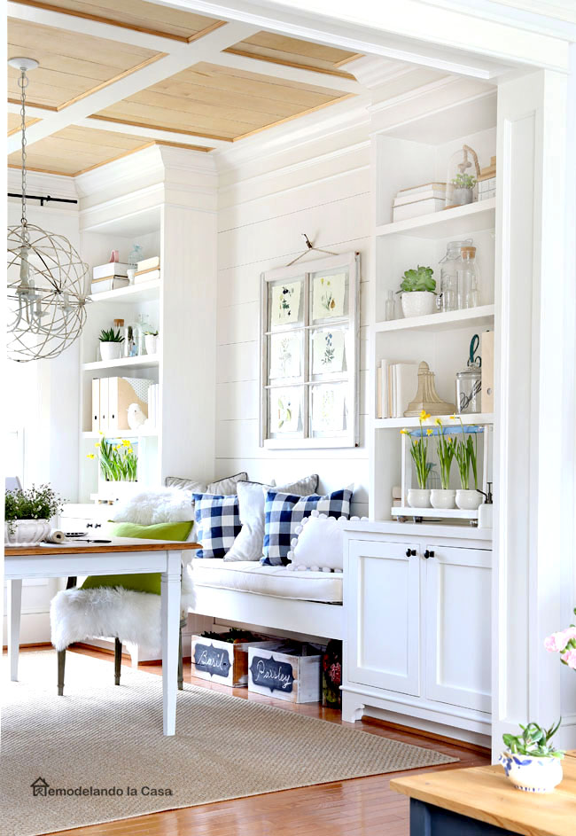 build-ins in dining room with green and yellow tones