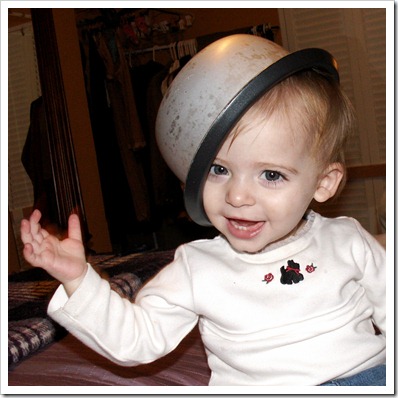 Elaine with rice cooker on her head