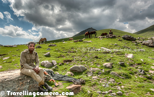 Peer Ki Gali is an amazing place on old Mughal road in Jammu & Kashmir State of India. This place is the highest passes on Srinagar Rajouri historic Mughal Road at 11300 Feets... Let's check out this Photo Journey to know more about this place with appropriate photographs...Various water streams can seen flowing through snow covered peaks of Peer-Ki-Gali hills. Cool freeze, freshening environment and roaming clouds all over makes this place wonderful. After talking to various folks at Peer ki Gali, we got to know that almost every day it rains on these hills. We spent two days around it and we also experienced rain showers both the days...Here is a photograph of a shopkeeper inside his small shop made up of stones. He had almost everything that is usually required for routine life in hills. These families come to these high hills with their cattle, as this place has got more than enough grazing land which becomes a problem during a particular time of the year. Ziarat of Peer Baba on hill top has gained its popularity. Almost every vehicle passing by Peer-ki-Gali stops here to enjoy the panaromic view as well as to take blessings of Peer Baba. Green layer on Peer-Ki-Gali hills looks amazing and it's a huge range of hills with green meadows...Shepherd sitting in these green hills around Peer ki Gali... Almost every alternate hill was full of sheeps and horses... This trend was only noticed around Peer-Ki-Gali on Mughal Road...In past this place have been of great interest for trekkers and now easily accessible for others as well. Tourism is picking up in this region of Jammu and Kashmir now. This will not only boost the economy of the state but also open new aspects to the residents.CRPF folks can seen here and there around these hills to make every person safe on these hills around Peer ki Gali. Really these folks are working really well to give confidence to common people to enjoy the beauty around Mughal Road.Sheeps all around in green hills of Peer Ki Gali, Kashmir, India.All these water streams make the whole environment more beautiful. All these streams have chilling water of melted snow of hill-tops. Dark clouds covering blue sky with lush green hills having multiple white-water streams - this whole combination makes Peer-Ki-Gali a unique place.Local folks on this stretch can organize various trekking trips with all arrangements for lodging in tents or some othe wooden houses, which can good source of income going forward.Jammu and Kashmir state of India is known as heaven on earth. In the seventeenth century the Mughal emperor Jahangir set his eyes on the valley of Kashmir and Peer-Ki-Gali is one of the place they used to stay. There is an old Mughal Residence in deep valley. Mughals said that if paradise is anywhere on the earth, it is here, while living in a houseboat on the mesmerizing Dal Lake.  In Jammu and Kashmir the most important tourist places are Kashmir, Srinagar, the Mughal Gardens, Gulmarg, Pahalgam, Jammu, and Ladakh...It will take a long more time to further develop the area but nobody can deny that it's magical. This whole stretch is magnetic. It draws you closer and closer. As we packed up, the beauty of the place wanted me to linger more. But I returned home with some amazing memories to cherish forever; vivid pics in the heart and mind that won't fade or get lost ever. It is a place that can't be expressed in words and that can't be explained in pics; just plan a trip and experience it all yourself.Before militancy intensified in 1989, tourism formed an important part of the Kashmiri economy. The tourism economy in the Kashmir valley was worst hit. Many five stars in Srinagar can be seen which are not well maintained now and owners can't afford to spend more on those properties. However, the holy shrines of Jammu and the Buddhist monasteries of Ladakh continue to remain popular pilgrimage and tourism destinations. Every year, thousands of Hindu pilgrims visit holy shrines of Vaishno Devi and Amarnath which has had significant impact on the state's economy.The Vaishno Devi yatra alone contributes Rs. 450+ crores to the local economy annually.Tourism in the Kashmir valley has rebounded in recent years and in 2009, the state became one of the top tourist destinations of India. Gulmarg, one of the most popular ski resort destinations in India, is also home to the world's highest green golf course. However with the decrease in violence in the state has boosted the states economy specifically tourism.Peer ki gali has religious importance as well. Most of the folks crossing through this place, stop by and spend some time around the mazar of Peer baba. This is of the holy places for Muslim saints. Here people from almost all the religions comes in large number to pray, on Thursday.There are some beautiful waterfalls around Peer Ki Gali and number/flow depends upon the time of the year & amount the snow these hills have got. Some of them are seasonal and many of them can be seen during most of the year.Kashmir's official language is Urdu. However the main languages spoken are Kashmiri in the Kashmir Valley, Ladakhi in Ladakh and Dogri in Jammu. Most people can speak Hindi as a second language. As elsewhere in India, English is fairly widely spoken among the educated classes and those involved in the tourist industry.Here i a photographs showing typical style of houses in Peer-Ki-Gali on Mughal Road in Jammu & Kashmir state of India. Mainly made up of rock-stones and flat roof made up of wood & mud. They are quite spacious and are seasonal. People go down to their main towns during snowfall in this region.A view of deep valley with curved roads from Peer-Ki-Gali, Jammu & Kashmir, India.