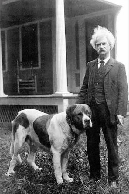 A photo of Mark Twain and his Dog in black and white