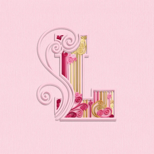 digitally quilled letter L in shades of pink and gold