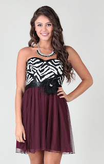 strapless dress with zebra corset and feather tie belt