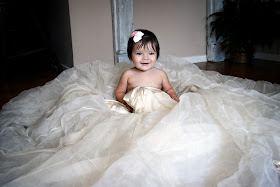 baby girl photo shoot in mom's wedding dress