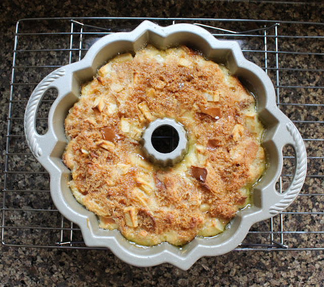 Food Lust People Love: Tart apple, sticky toffee and vanilla custard filled bread come together in this toffee apple bread pudding Bundt to create a dessert that is way more than the sum of its parts.