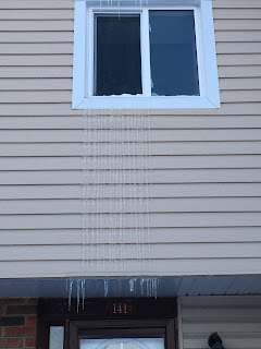 Ice forming on my siding all the way down from my window to the overhang.
