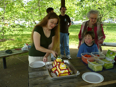 harry potter castle cake. Melissa cutting the castle