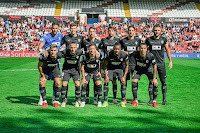 ELCHE C. F. Temporada 2021-22. Kiko Casilla, Gumbau, Fidel, Josema, Bigas, Gonzalo Verdú. Lucas Boyé, Benedetto, Pablo Piatti, Palacios, Mascarell. RAYO VALLECANO DE MADRID 2 ELCHE C. F. 1. 17/10/2021. Campeonato de Liga de 1ª División, jornada 9. Madrid, estadio de Vallecas. GOLES: 0-1: 14’, Lucas Boyé. 1-1: 26’, Mario Hernández. 2-1: 65’, Nteka.