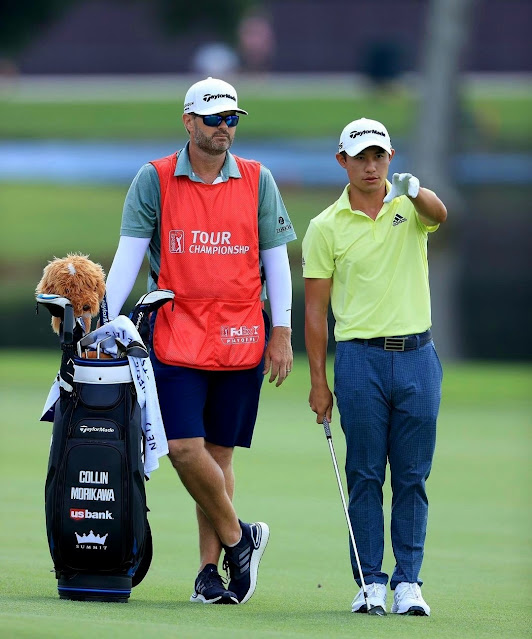 Collin Morikawa (right) and his caddie J.J. Jakovac (left) at the Tour Championship