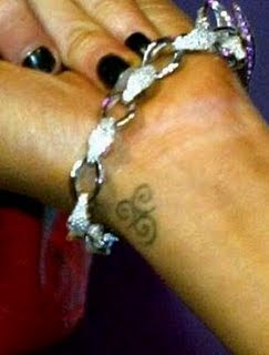 Christina Aguilera Tattoos on her back