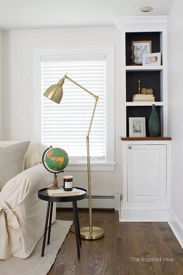 A modern traditional living room makeover. A combination of farmhouse charm, antique finishes, and minimal modern style.