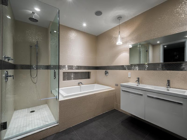 Photo of second modern bathroom with shower cabin and bathtub