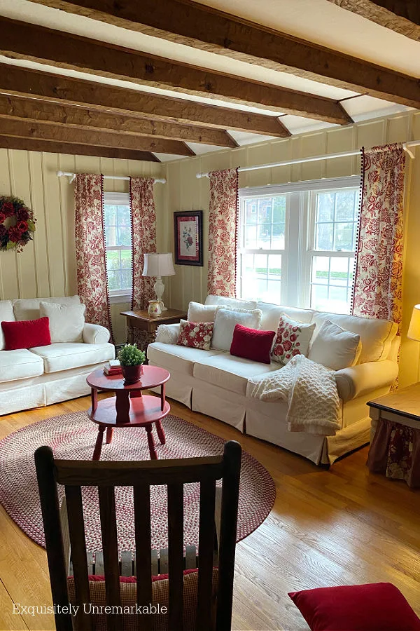 Cottage Style Living Room With Beams On Ceiling