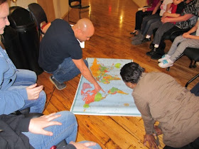 Participants in NeighborCircles show others on a world map the origins of their families.