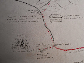 A detail from the map, showing three walking figures.