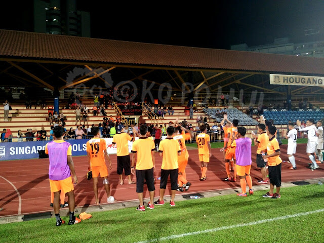 Hougang United's players showing appreciation to HOOLs (file)
