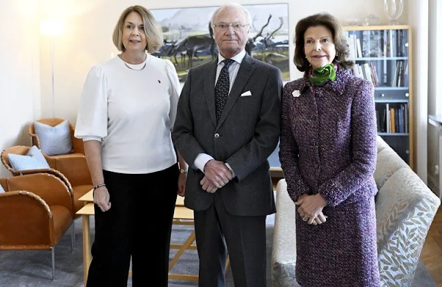 Queen Silvia wore a purple grey plaid wool cashmere blend jacket by Oscar de la Renta. County Governor Marita Ljung