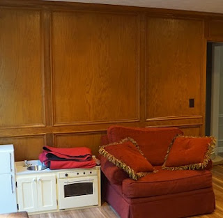 Judges Paneling with mismatched fake wood floor