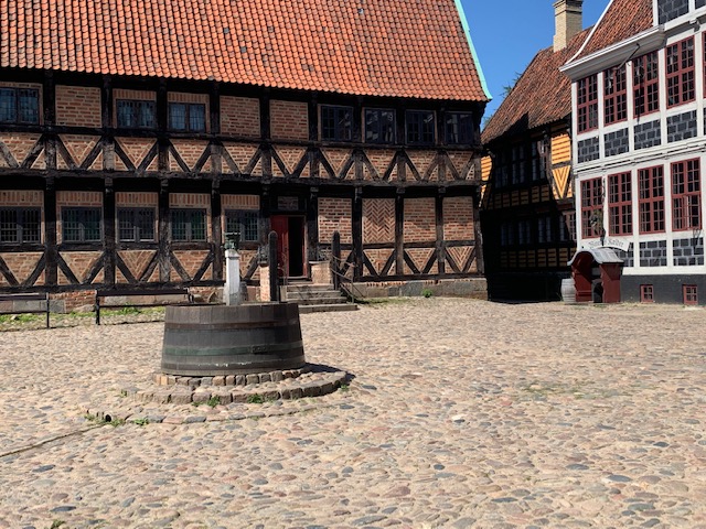 Old fashioned timbered buildings in a cobbled street square