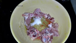 Add ginger-garlic paste to mutton pieces 