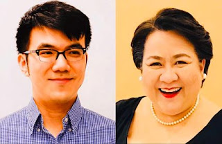 The image shows Mr. Bryan Dai wearing blue polo and eyeglasses. His hair is black and his skin is fair shown at the left. At the right is the National president Ms. Mona Veluz wearing black dress, necklace with beads and ear beads. Her hair is also black and has a fair skin.