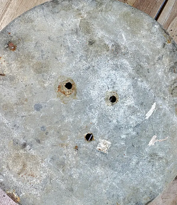 holes in bottom of galvanized tin