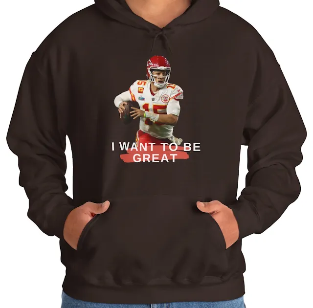 A Hoodie With NFL Player Patrick Mahomes Wearing White Jersey Running Holding The Duke and Text I Want To Be Great